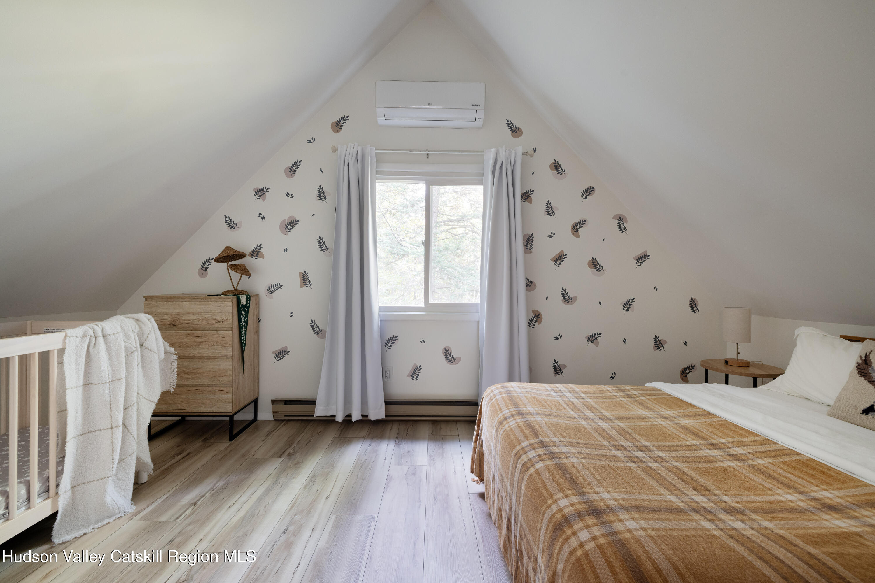 6 Clearview Road Hunter, NY 12442 - Photo 27 of 31 a bedroom with a bed and a window