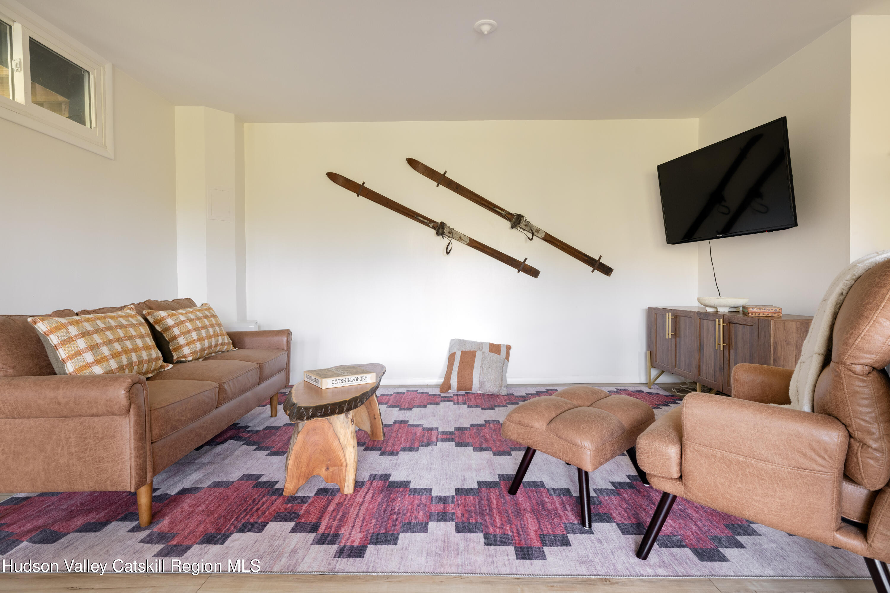 6 Clearview Road Hunter, NY 12442 - Photo 7 of 31 a living room with furniture and a flat screen tv