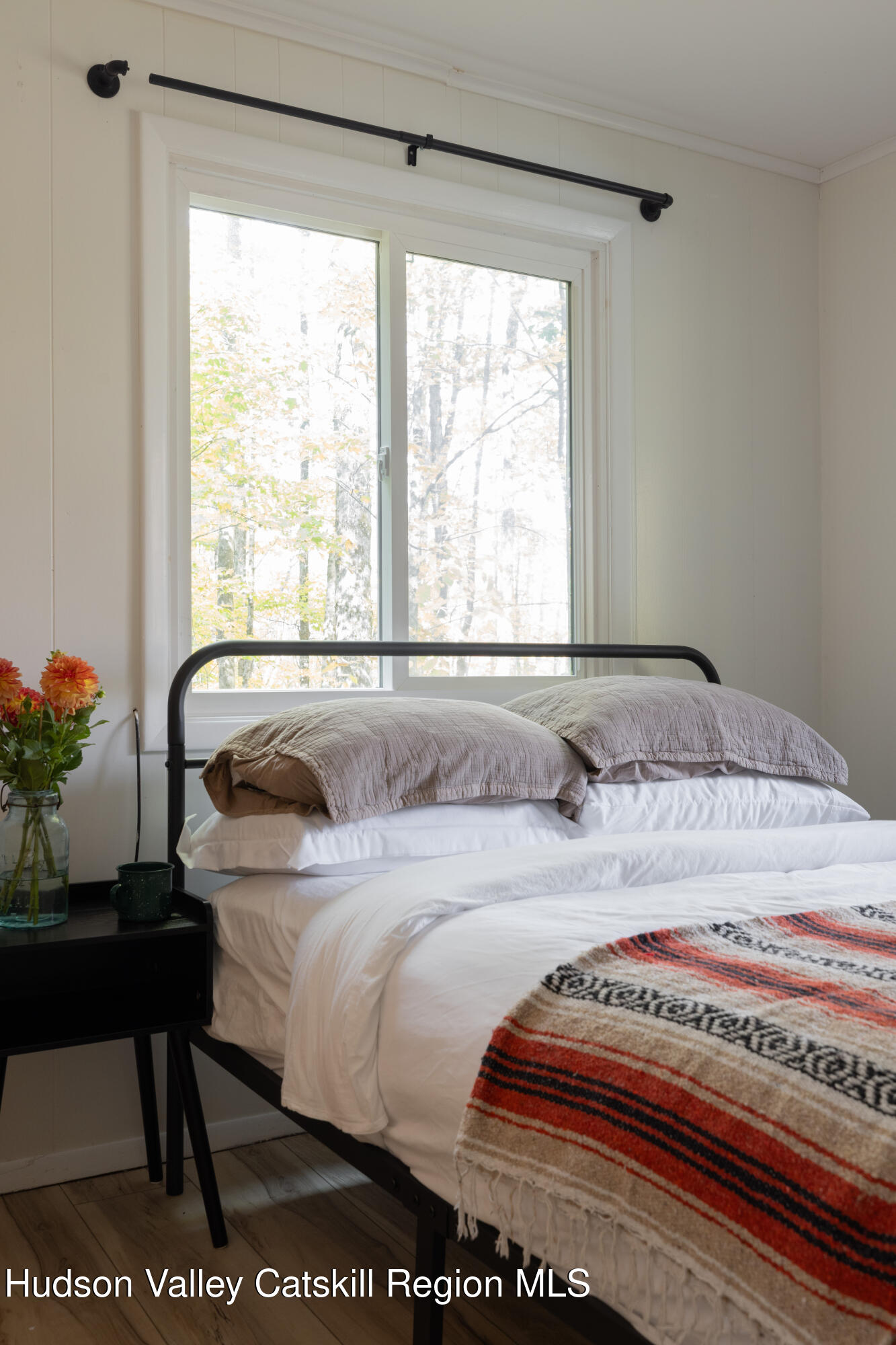 6 Clearview Road Hunter, NY 12442 - Photo 10 of 31 a bedroom with a bed and a table in it