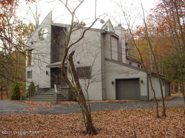 726 Decker Road Bushkill, PA 18324 - Photo 1 of 28 a front view of a house