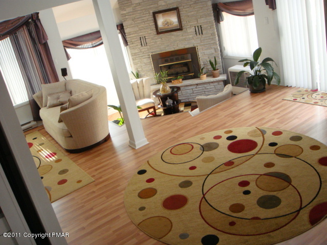 726 Decker Road Bushkill, PA 18324 - Photo 6 of 28 a living room with furniture and a fireplace