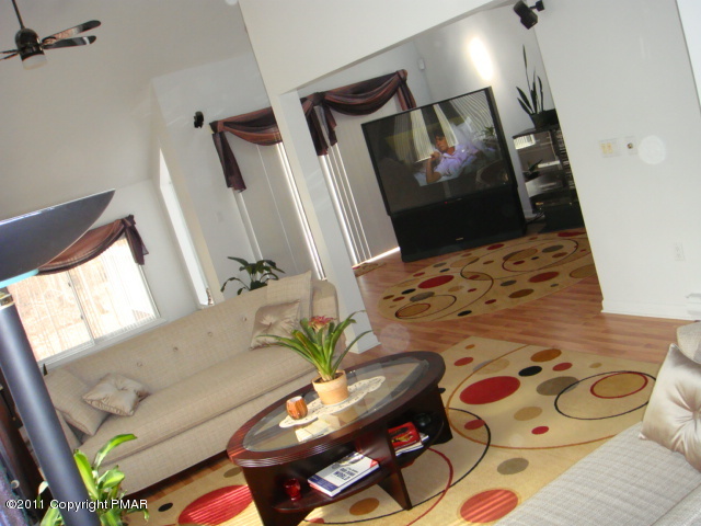726 Decker Road Bushkill, PA 18324 - Photo 8 of 28 a living room with furniture and flat screen tv