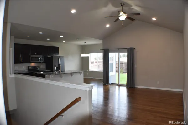 a view of a kitchen with a sink