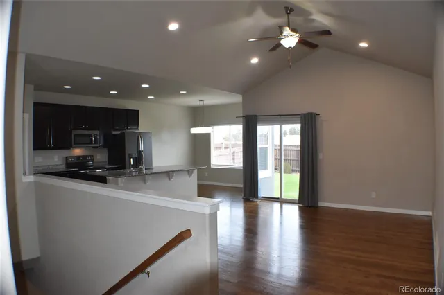 a view of a kitchen with a sink