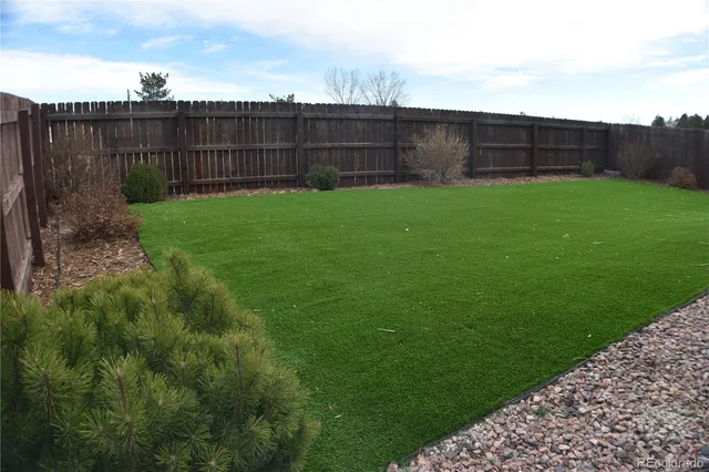 a view of a yard with an outdoor space