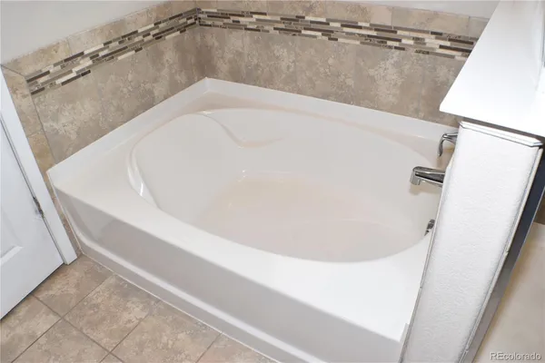 a view of a bathtub in bathroom