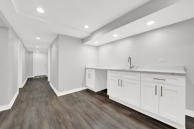 a view of kitchen with wooden floor