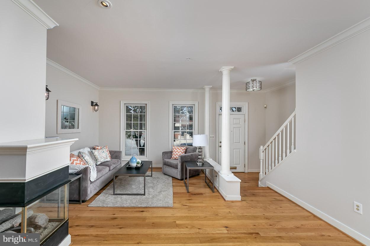 211 West Hill Street Baltimore, MD 21230 - Photo 11 of 52 Living Room with Newly Painted Gas Fireplace!