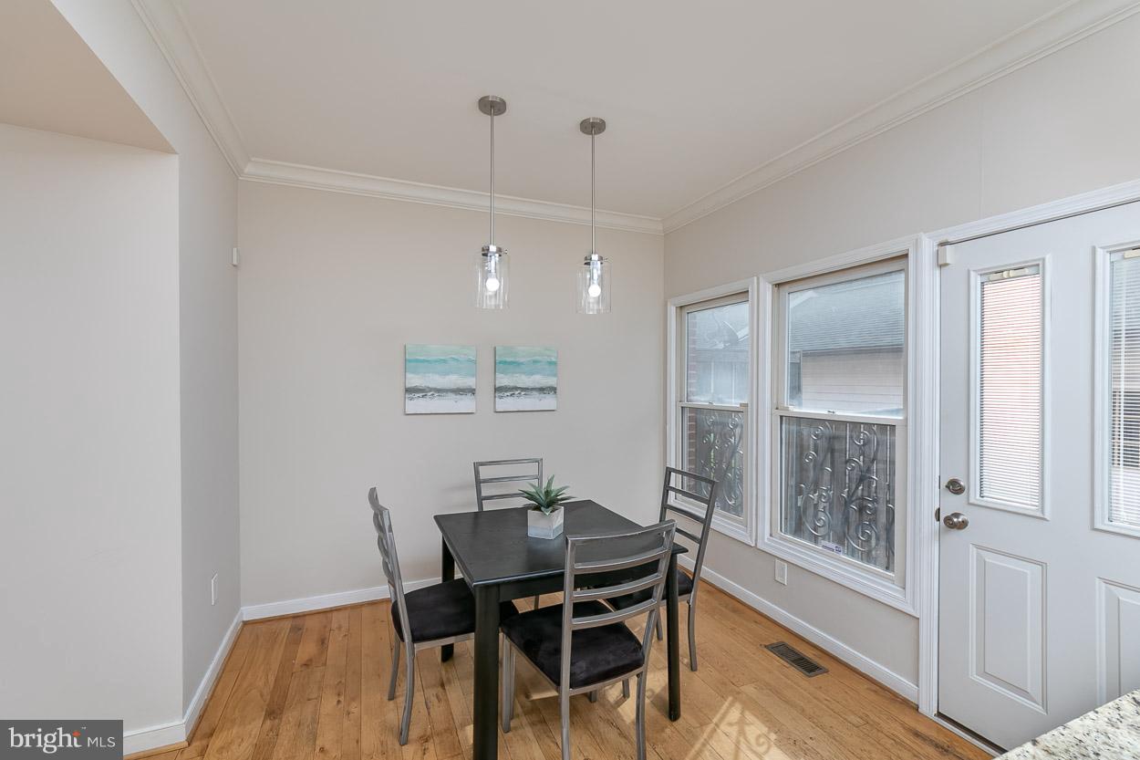 211 West Hill Street Baltimore, MD 21230 - Photo 7 of 52 Breakfast Nook with New Chrome Pendant Lights!
