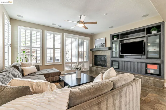 a kitchen with stainless steel appliances granite countertop a stove and a sink