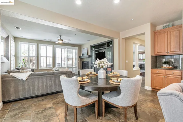a view of a living room and dining room
