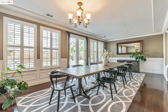 a large bed with a lamp