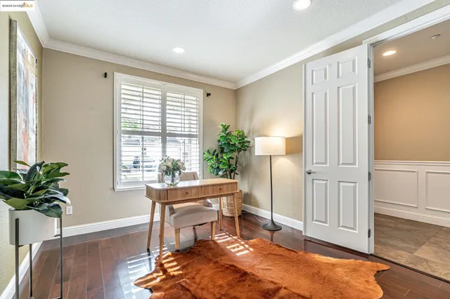 a bedroom with a bed and a lamp