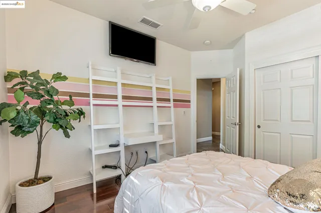 a view of a house with a backyard porch and sitting area