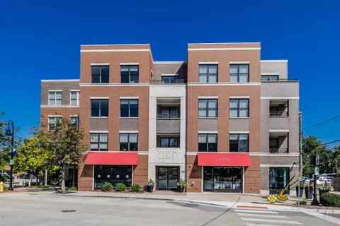 a front view of a building with street view