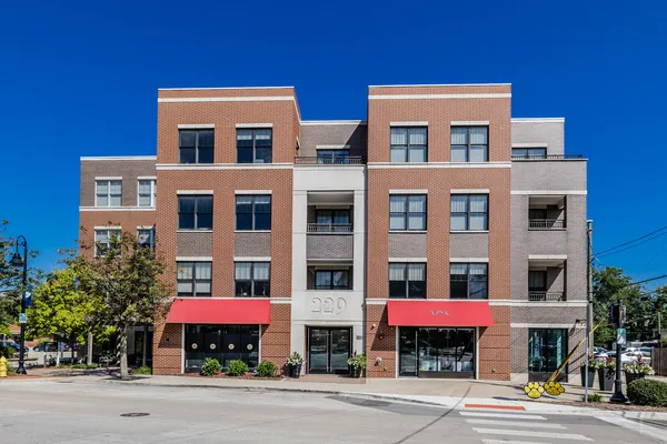a front view of a building with street view