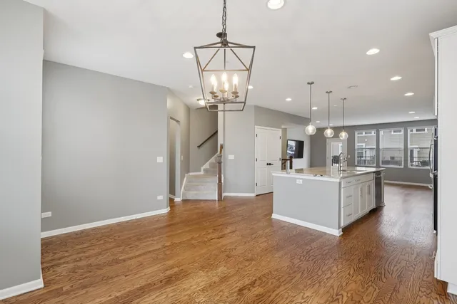 a view of a kitchen and a chandelier