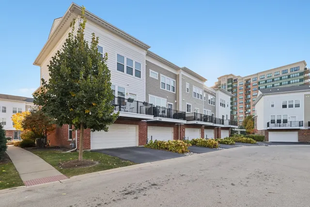 a view of a street with a building in the background
