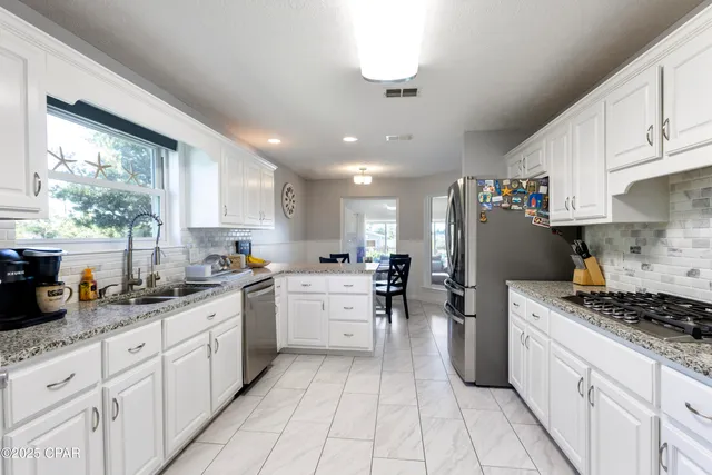 $710,000 | 7033 Benton Drive, Panama City, FL 32404