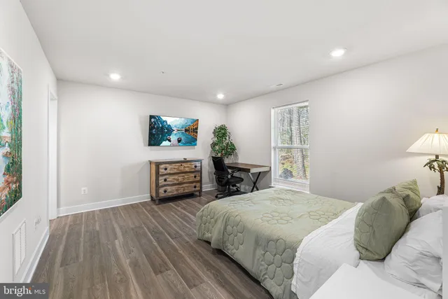 a bathroom with a shower and a toilet