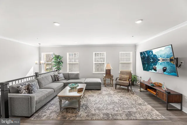 a large kitchen with a table and chairs