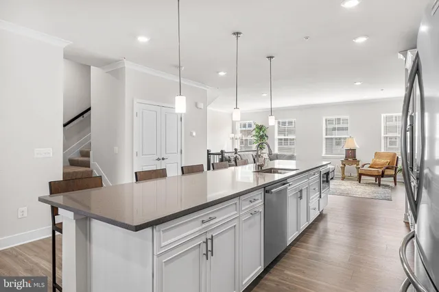 a dining room with furniture and a mirror