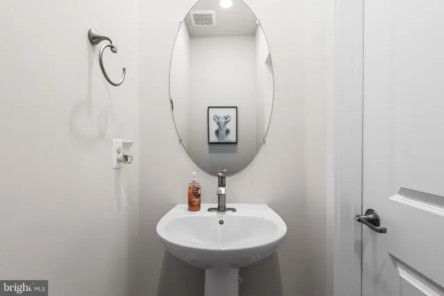 a view of a balcony with wooden floor and fence