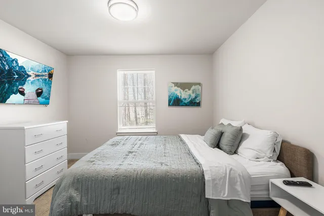 a view of a balcony with a floor to ceiling window