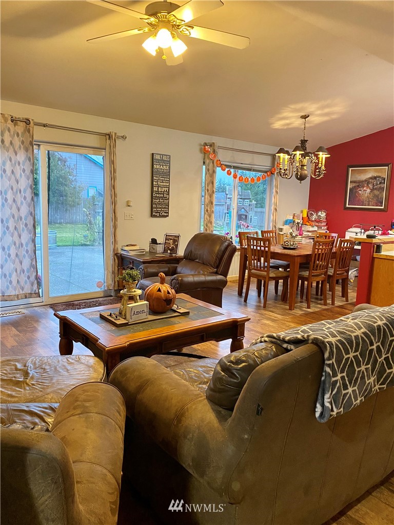 8016 188th Avenue Southwest Rochester, WA 98579 - Photo 5 of 16 a living room with furniture and a large window
