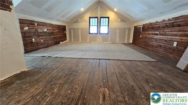 a bed room with a bed and a couch