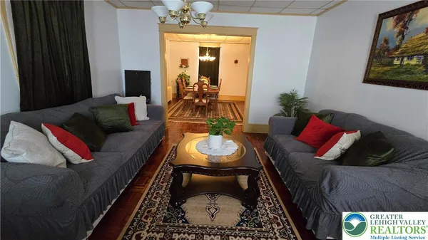 a living room with furniture and a window