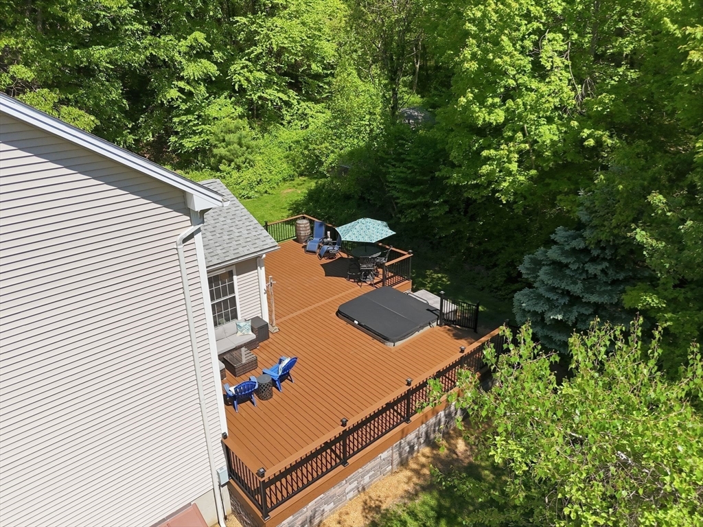 345 Bragg Road Warren, MA 01585 - Photo 36 of 41 a view of a backyard with sitting area