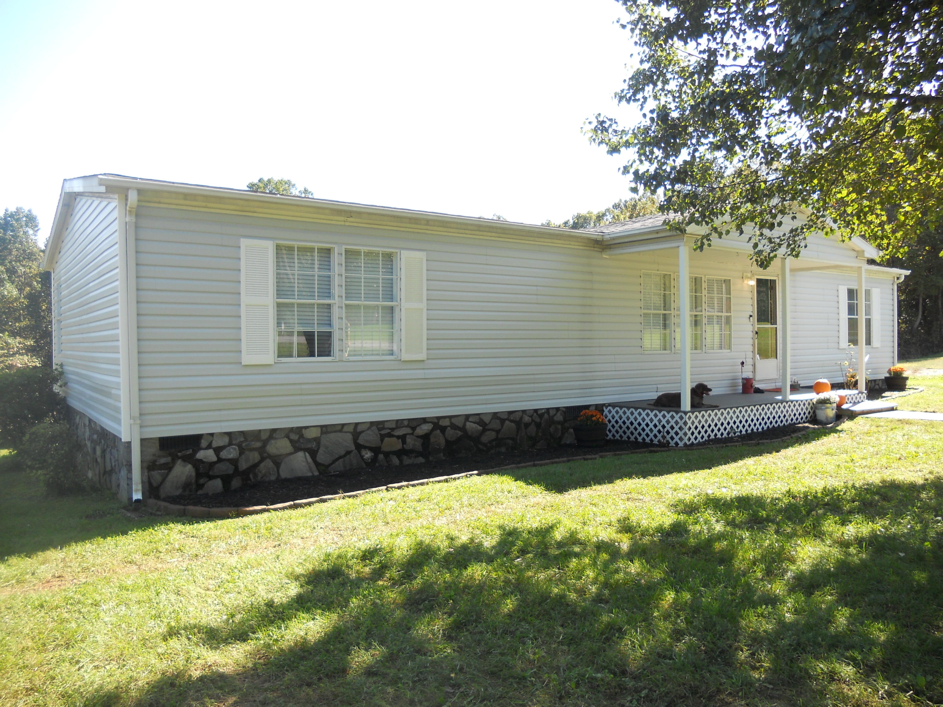 1504 Turner Branch Road Goodview, VA 24095 - Photo 11 of 64 a view of a house with swimming pool and sitting area