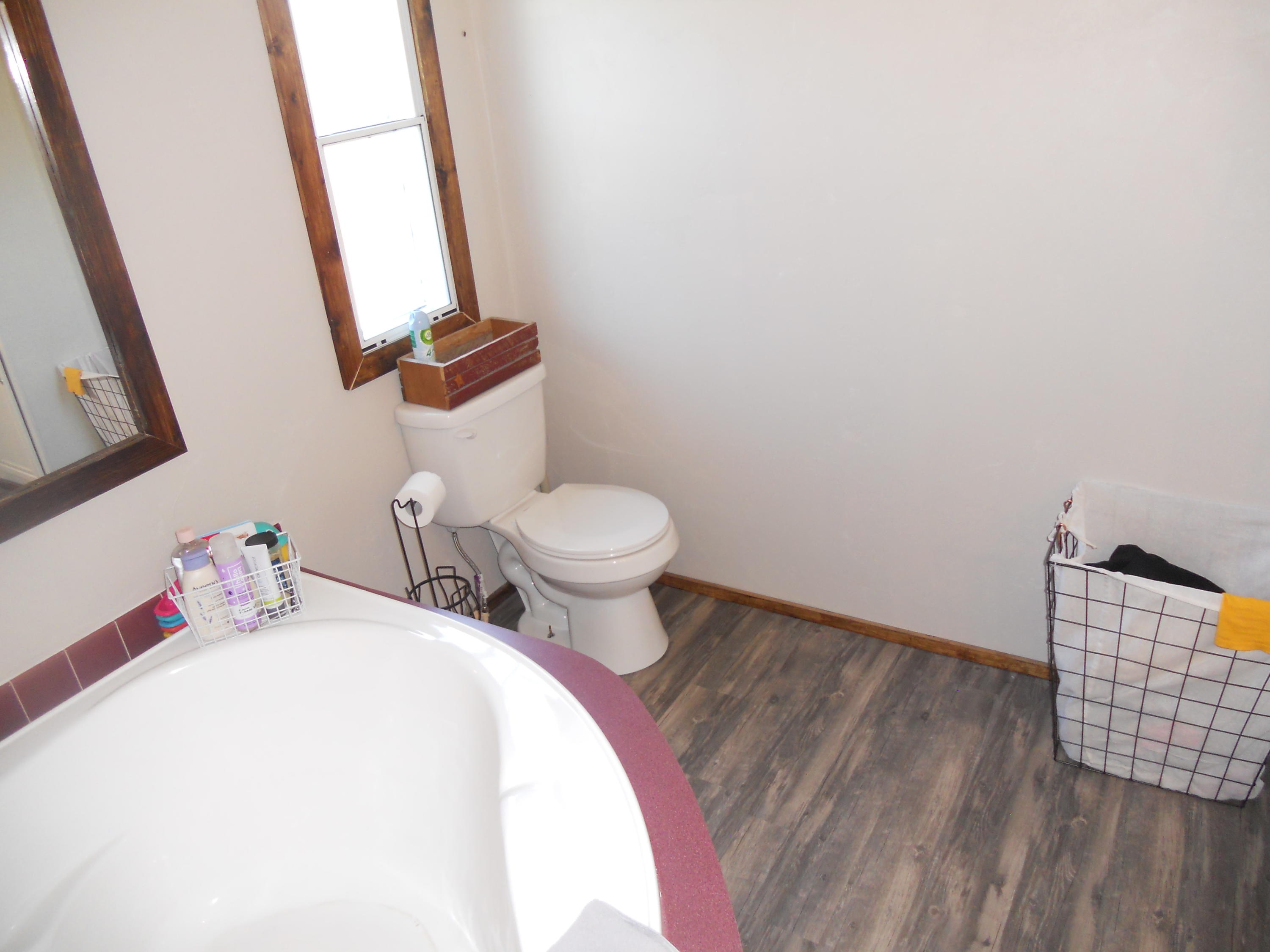 1504 Turner Branch Road Goodview, VA 24095 - Photo 35 of 64 a bathroom with a sink and a mirror