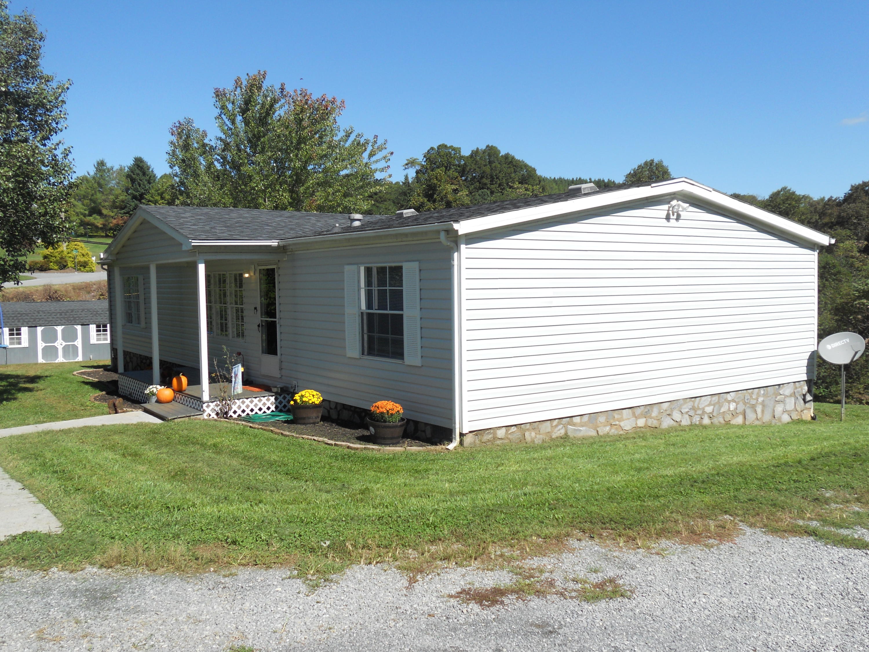 1504 Turner Branch Road Goodview, VA 24095 - Photo 64 of 64 a front view of house with yard and green space