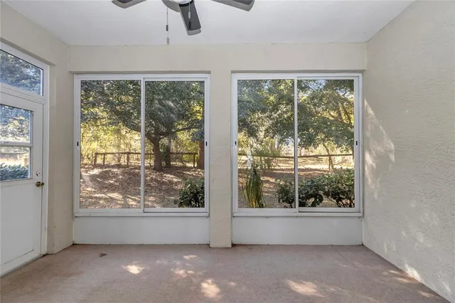 a view of livingroom with furniture and windows