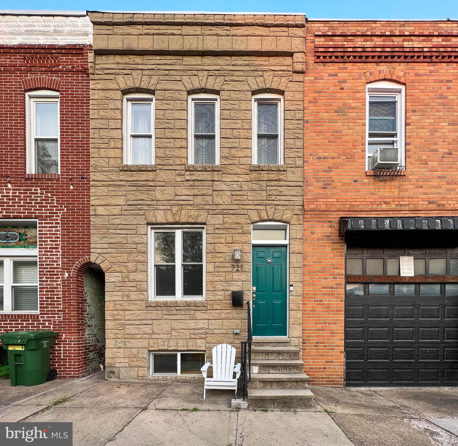 721 South Milton Avenue Baltimore, MD 21224 - Photo 1 of 23 a front view of a house with stairs