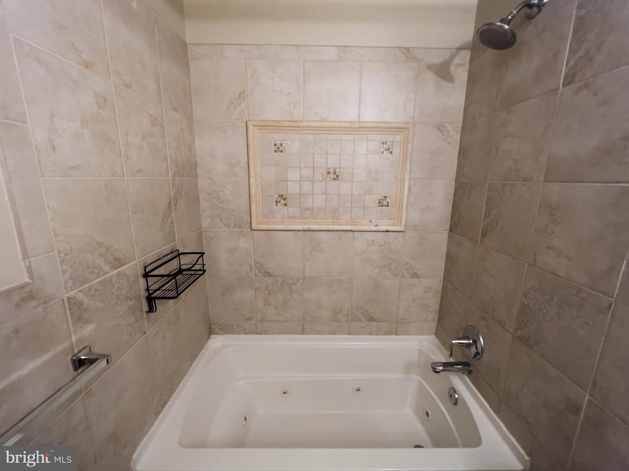 721 South Milton Avenue Baltimore, MD 21224 - Photo 11 of 23 a bathroom with a bathtub