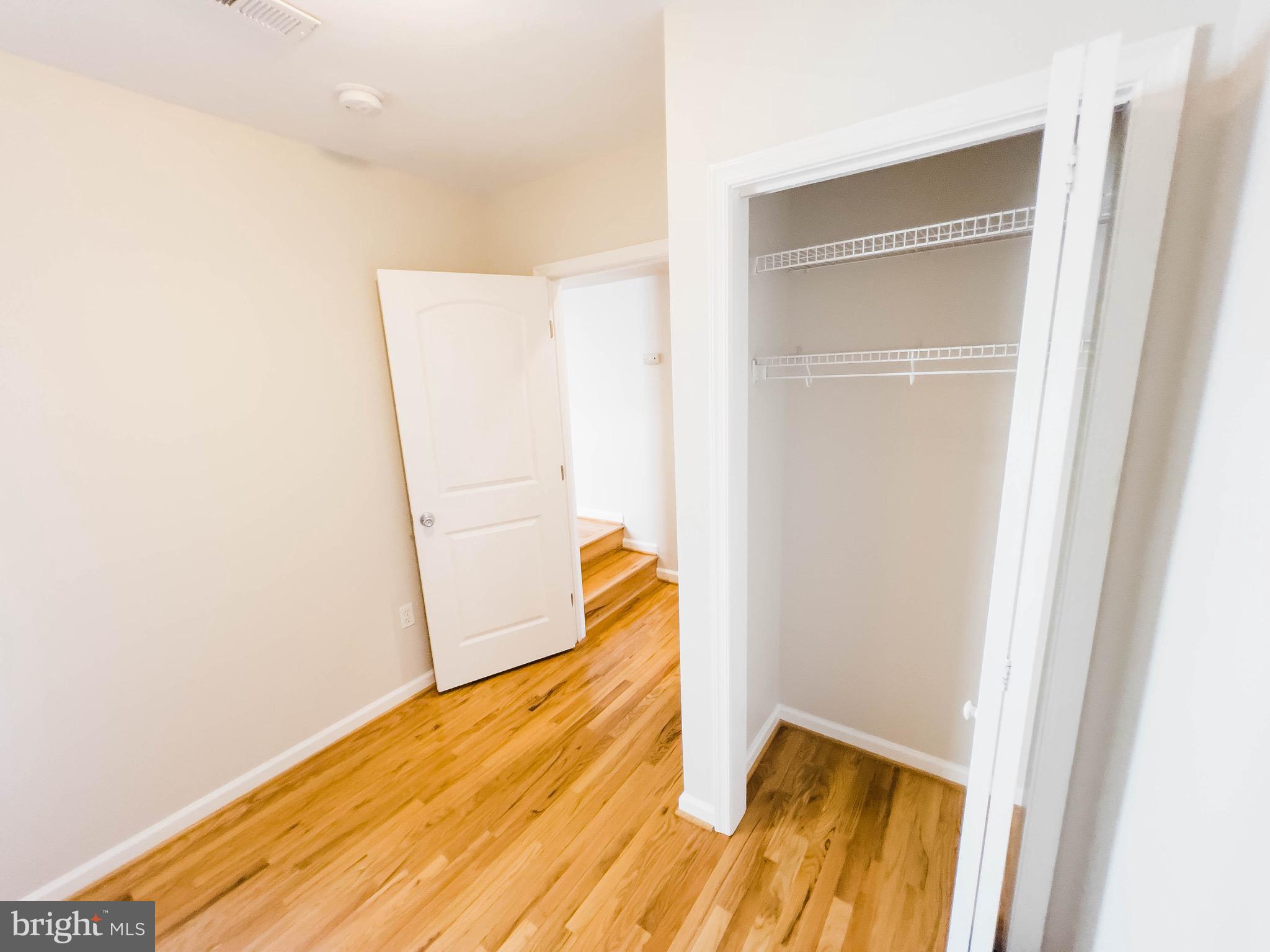 721 South Milton Avenue Baltimore, MD 21224 - Photo 16 of 23 a view of walk in closet with empty tub
