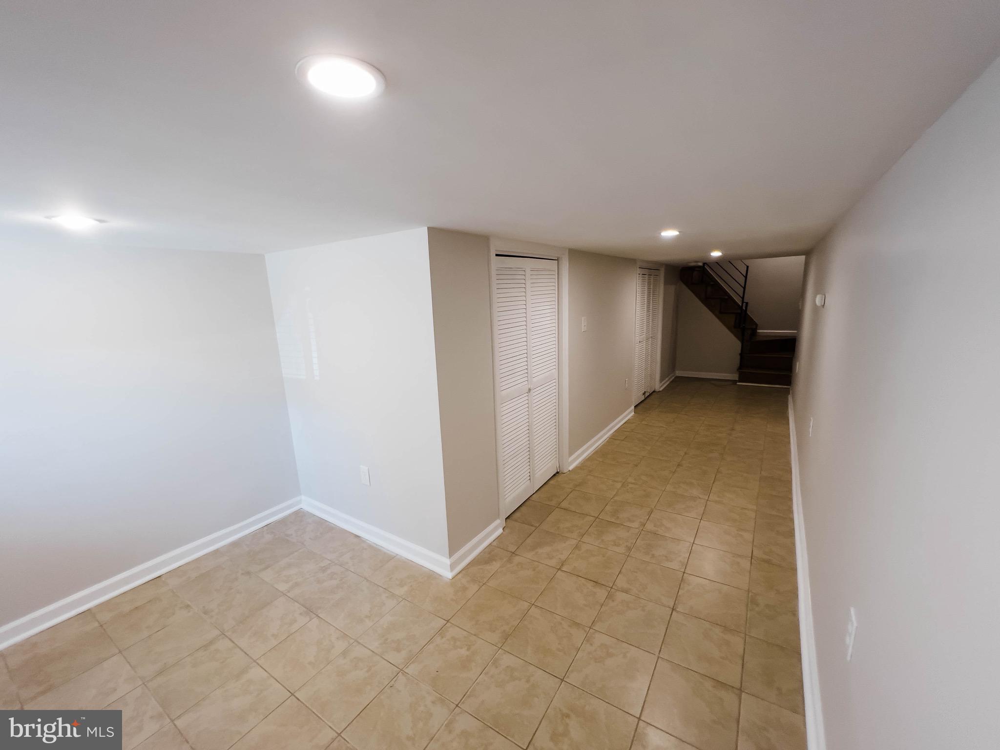 721 South Milton Avenue Baltimore, MD 21224 - Photo 19 of 23 an empty room with a natural light