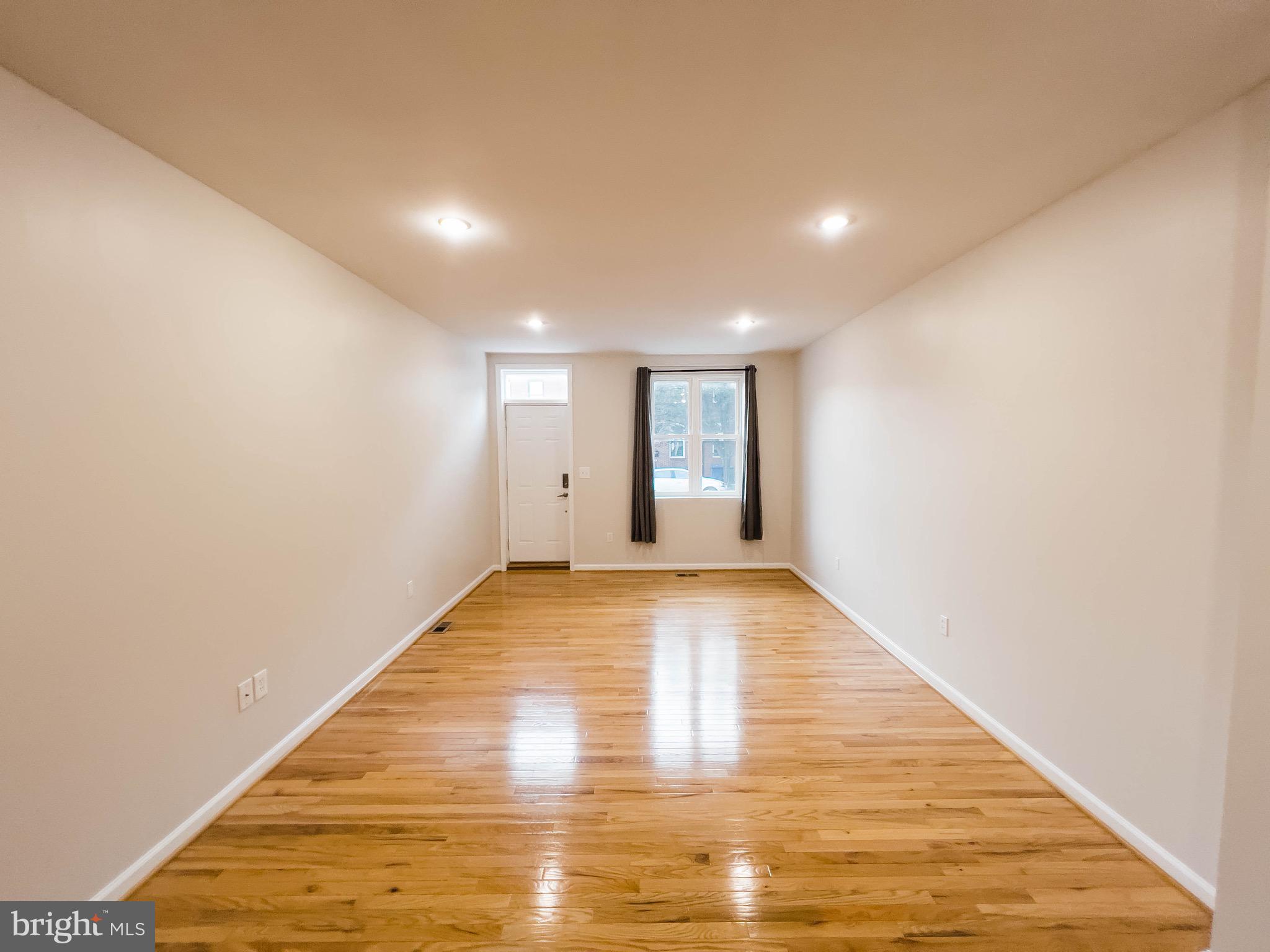 721 South Milton Avenue Baltimore, MD 21224 - Photo 2 of 23 a view of an empty room