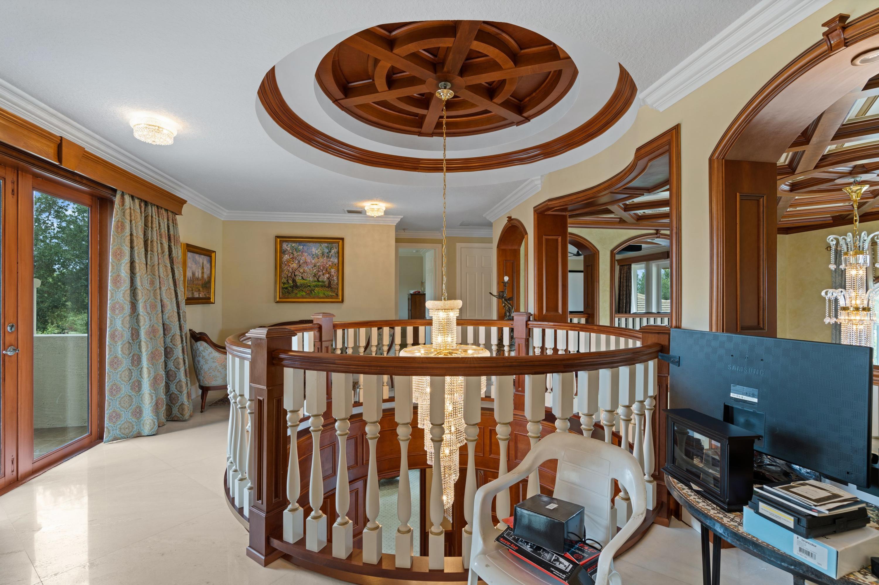 9932 Equus Circle Boynton Beach, FL 33472 - Photo 10 of 26 a view of entryway and hall with a workspace