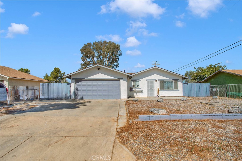 18288 Larkspur Road Adelanto, CA 92301 - Photo 1 of 1 a view of a house with a yard