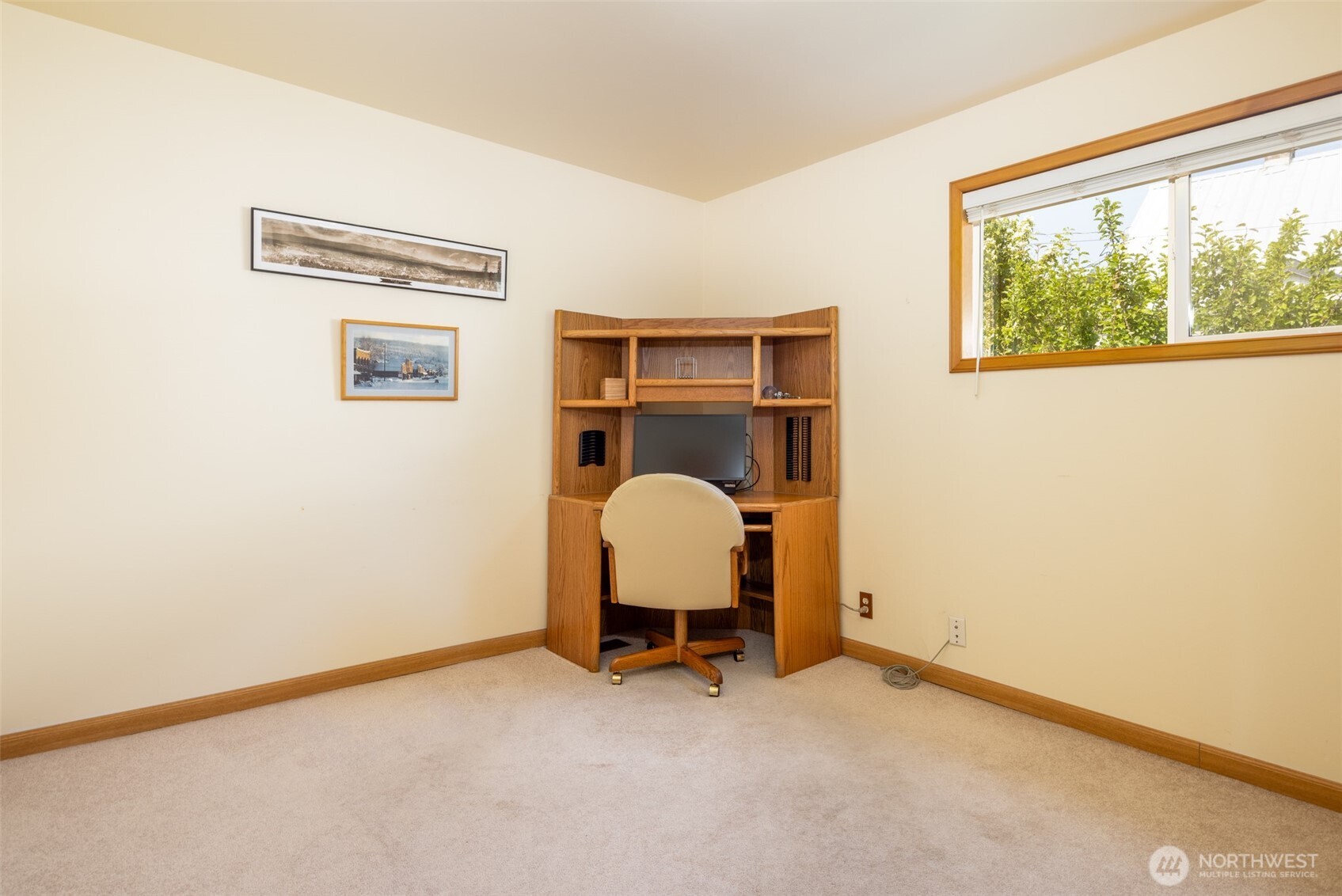 114 4th Street Roslyn, WA 98941 - Photo 12 of 33 a view of a workspace with furniture and a window