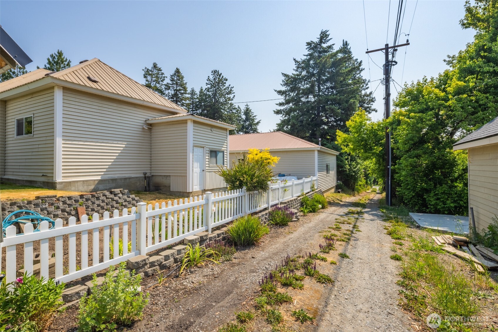 114 4th Street Roslyn, WA 98941 - Photo 30 of 33 a view of a house with a yard and plants