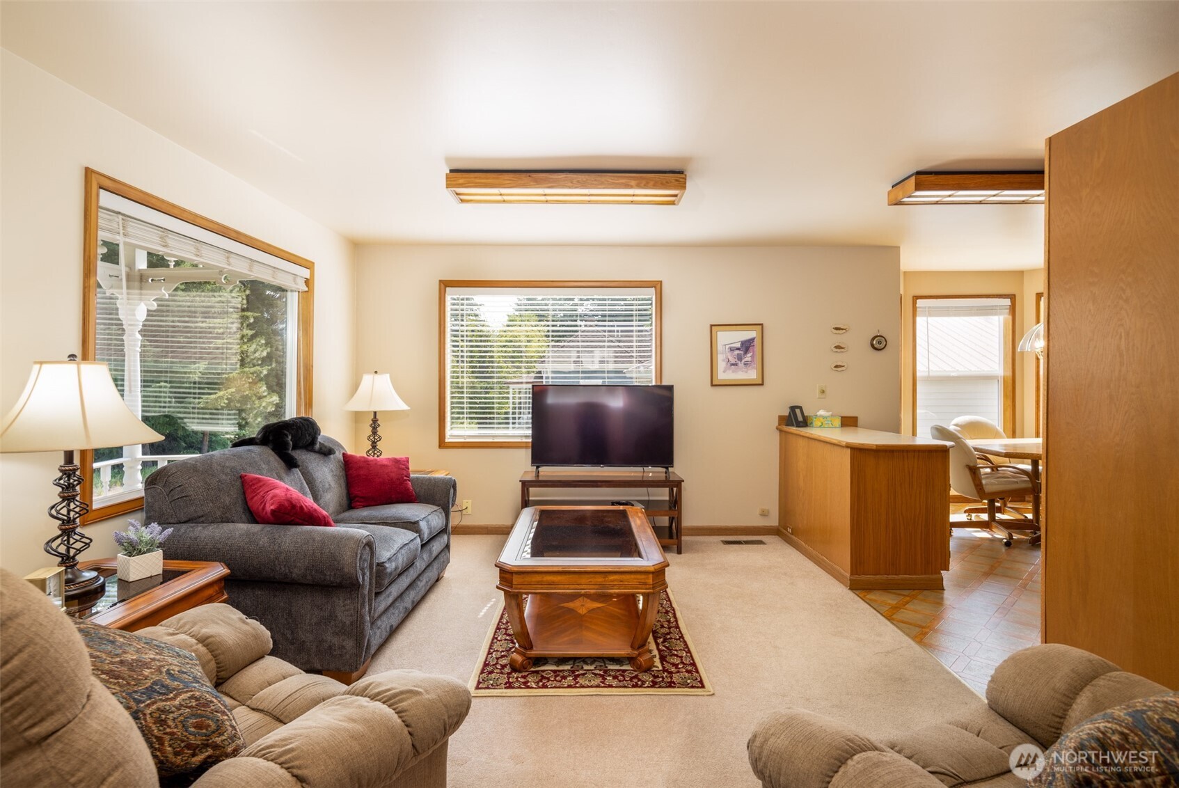114 4th Street Roslyn, WA 98941 - Photo 4 of 33 a living room with furniture and a flat screen tv