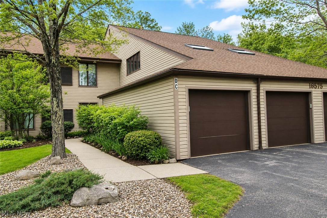 16575 Wren Road, Unit 3C Chagrin Falls, OH 44023 - Photo 26 of 29 Attached garage with floored loft area for extra storage