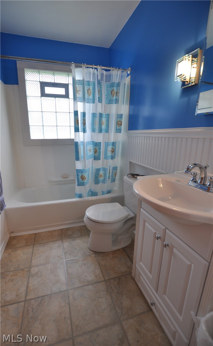 Updated bathroom with glass block for loads of light