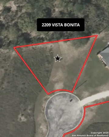 a sign that is on top of a wall