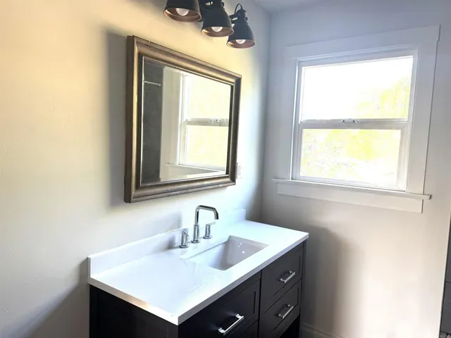 an empty room and wooden door